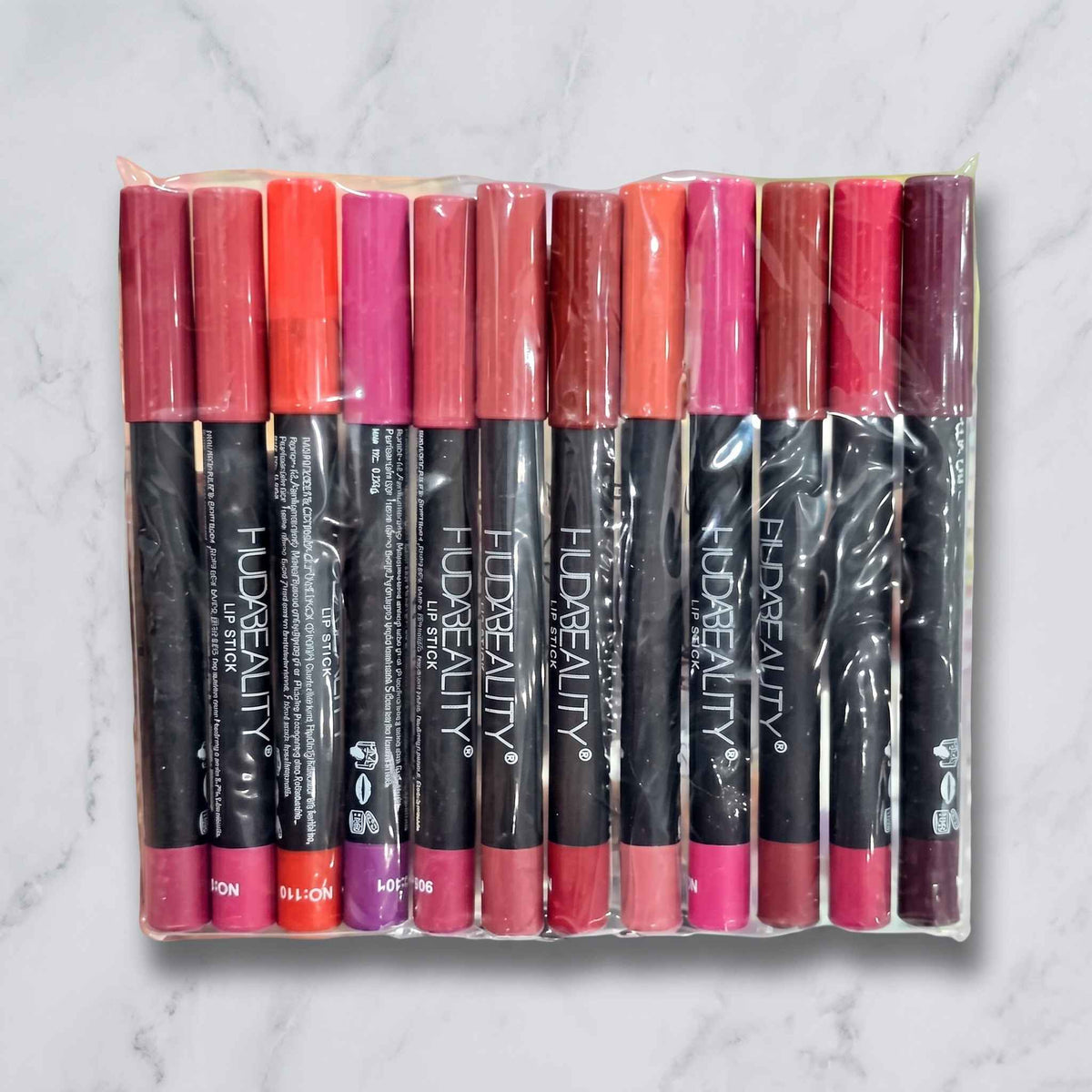 ## Huda Beauty Lip Pencil Set – 12 Stunning Shades for Smooth, Defined & Beautiful Lips